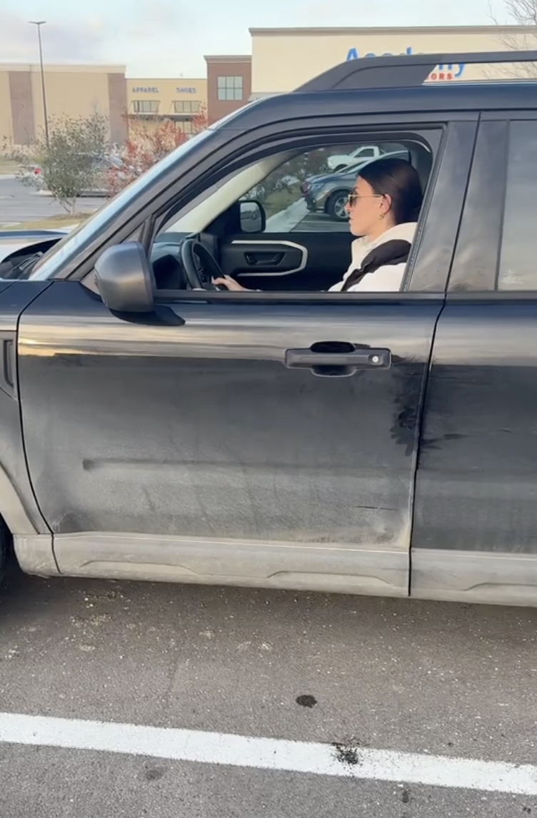 woman backing up a bronco