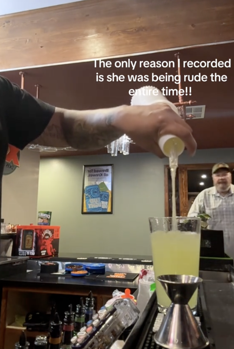 bartender pouring a drink