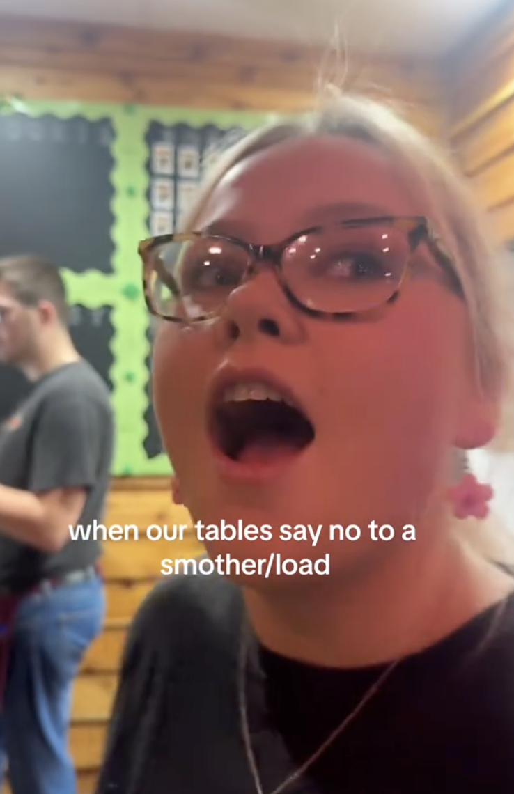 a woman working at a restaurant