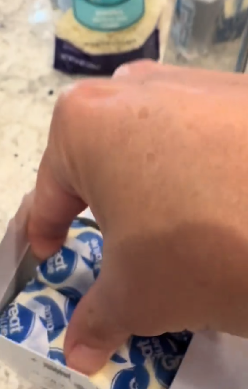 Taking butter out of the package