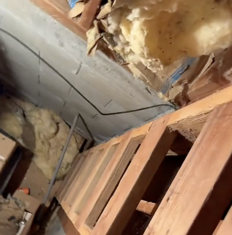 stairs leading down to a secret room