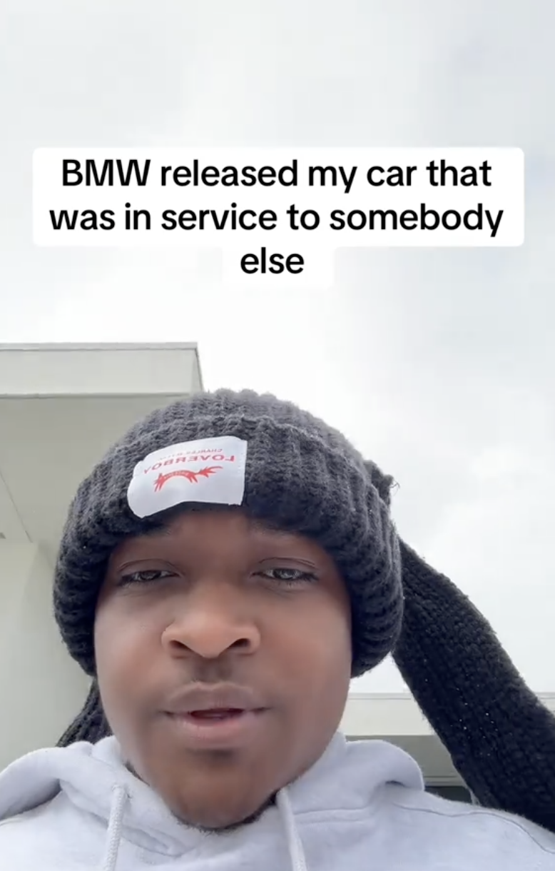 a young man wearing a hat