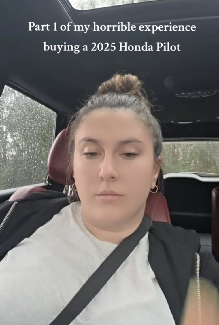 woman talking in her car