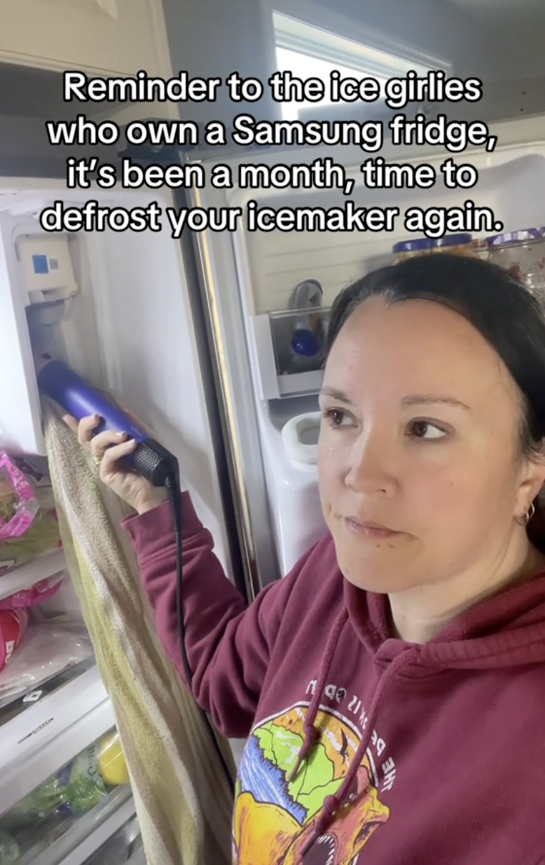 woman with her refrigerator door open