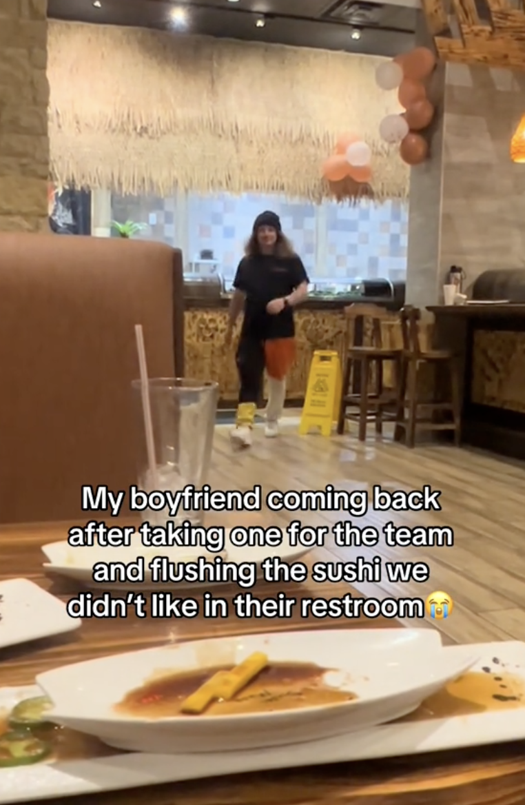 man walking in a restaurant