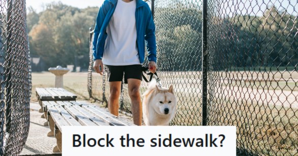 Man walking his Chow Chow mix through a ball field