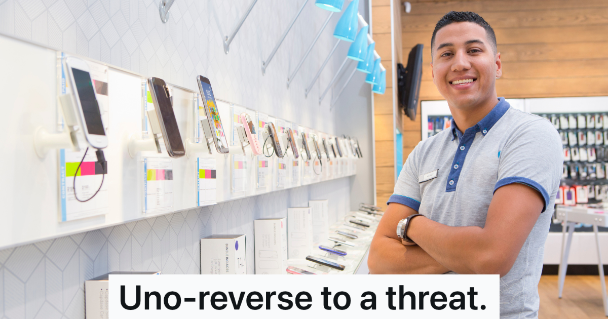 smiling cell phone store employee