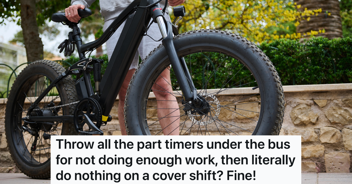 man standing next to an e-bike