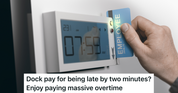 employee swiping card to clock in for work