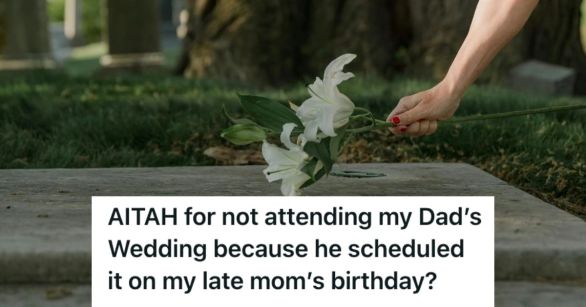 A person putting white flowers on the grave of a loved one