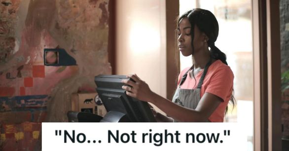Woman working at the cashier of a store