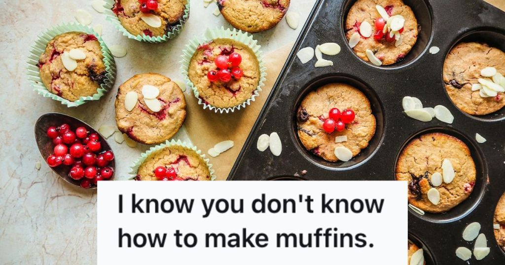 A tray of muffins with cherries, almond slices, and other toppings