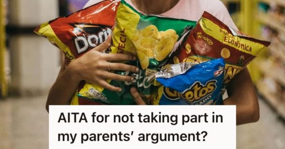 Person holding bags of chips in the supermarket