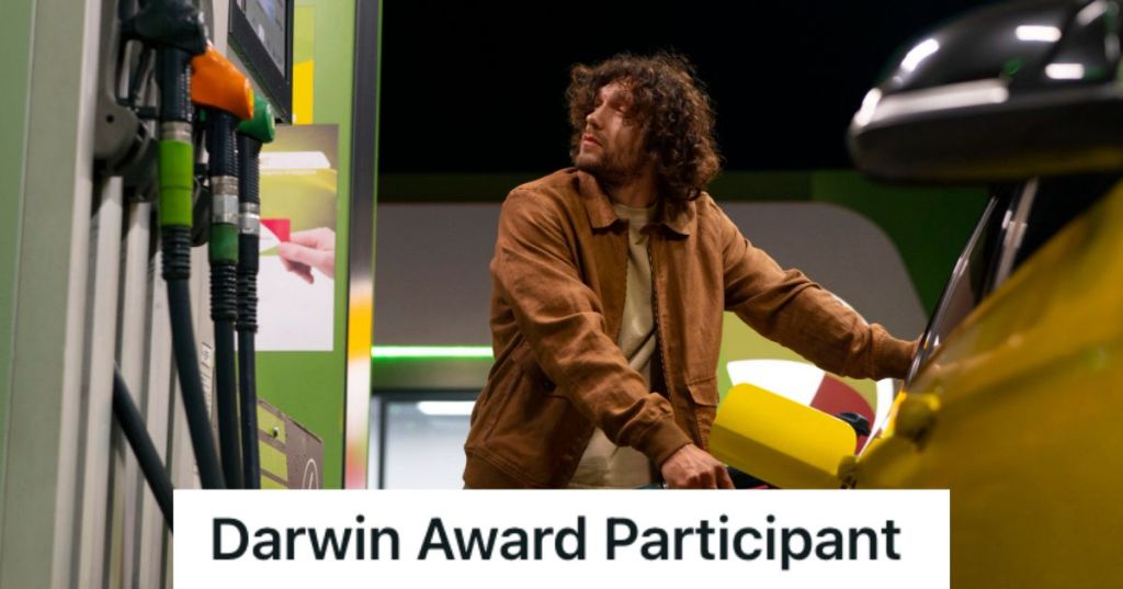Man filling up his car with fuel at a gas station