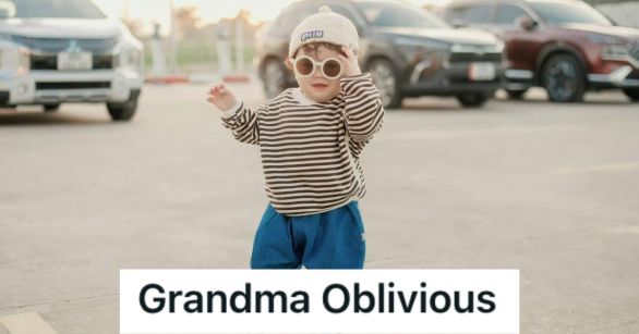 Toddler wearing cool outfit and sunglasses standing on a parking lot