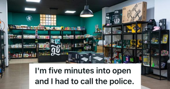 A clean and empty board game store with shelves and boxes of products.