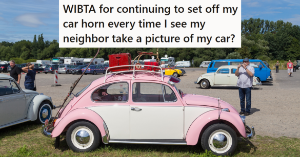 Man Taking Picture of Pink VW Bug