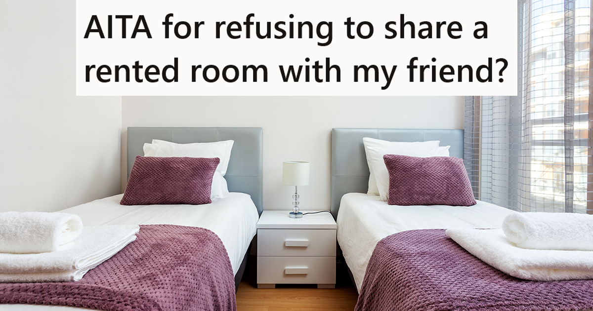 empty bedroom with two beds 