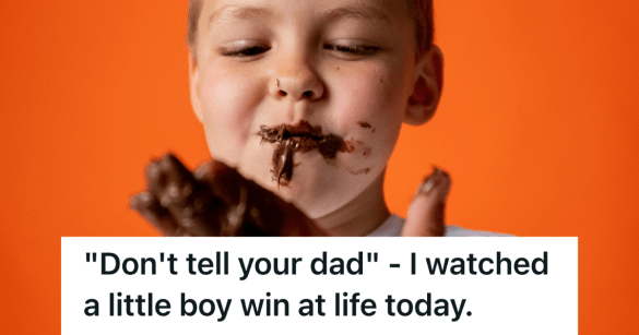 boy smiling and eating chocolate
