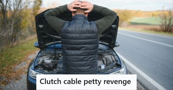 Man looking at car with hood open