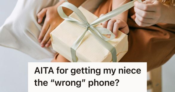 girl opening up a nice gift with a bow on it