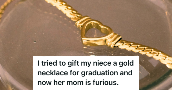 gold necklace with a heart in it