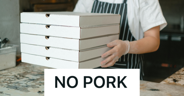 man holding a stack of pizza boxes