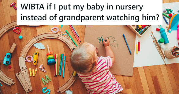 baby playing with crayons on the floor