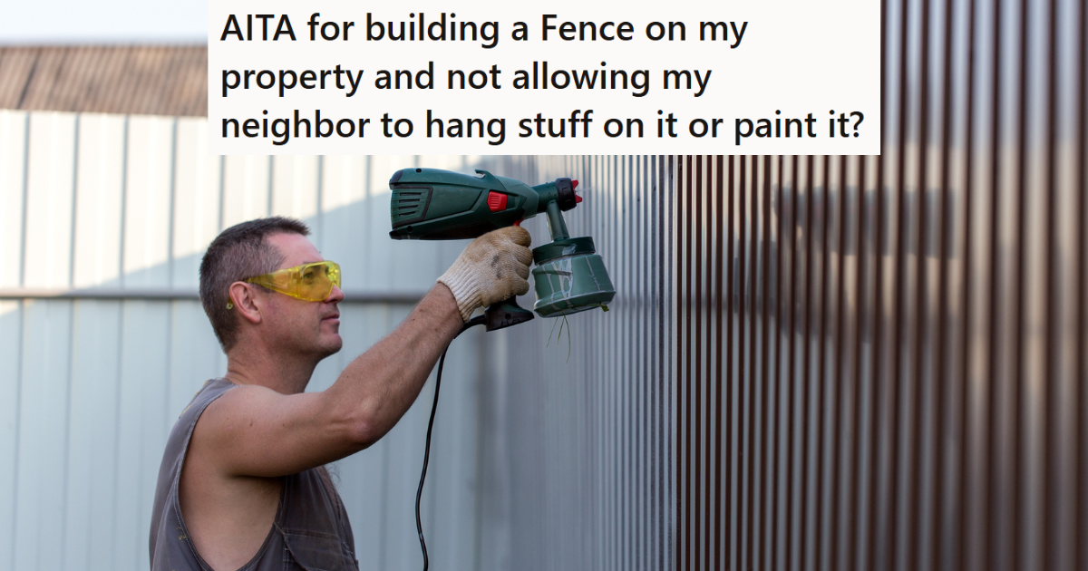 Man painting a fence