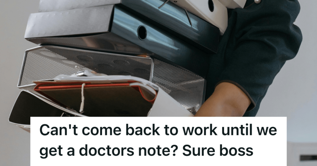 person carrying a stack of binders