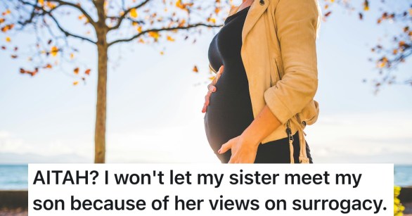 pregnant woman holding belly outside