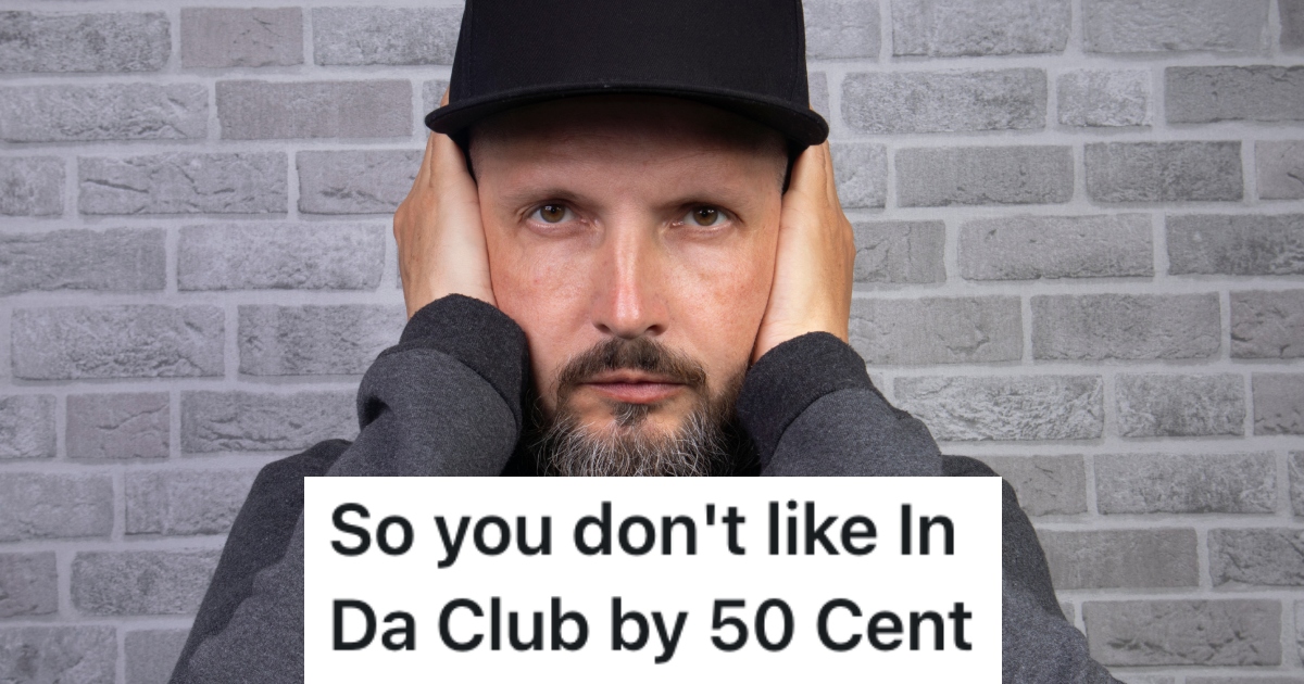 man covering his ears