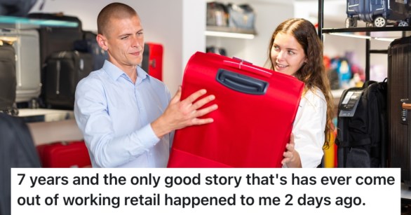 man looking at luggage in a store