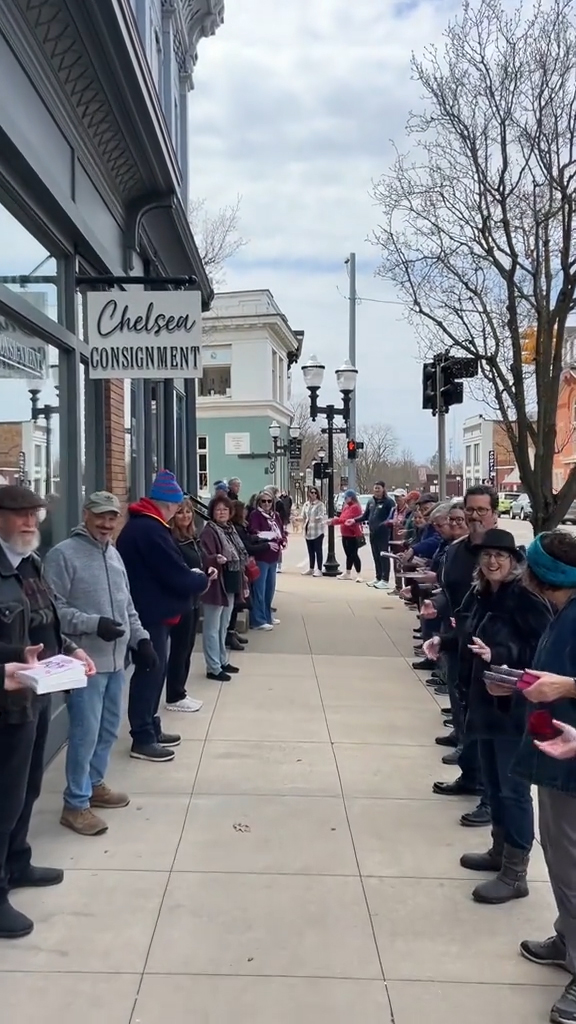 A line of people in Chelsea, Michigan