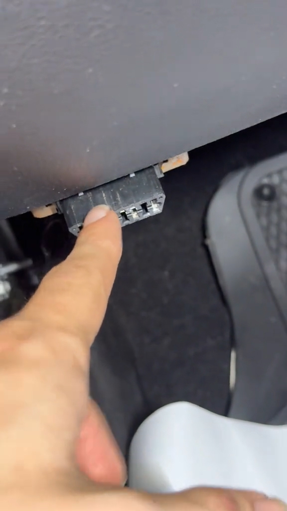 The OBD port in a Jeep