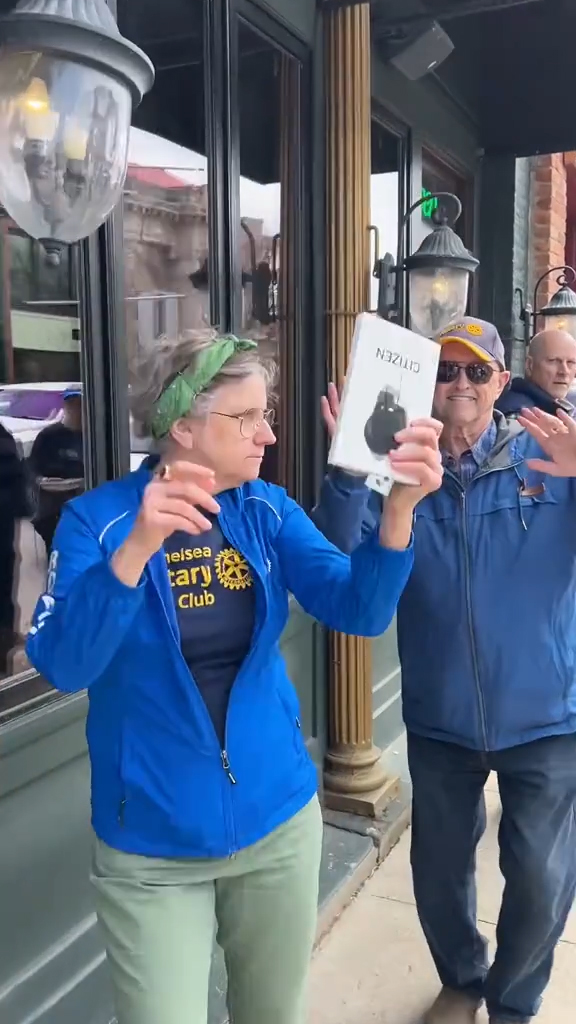 A line of people in Chelsea, Michigan