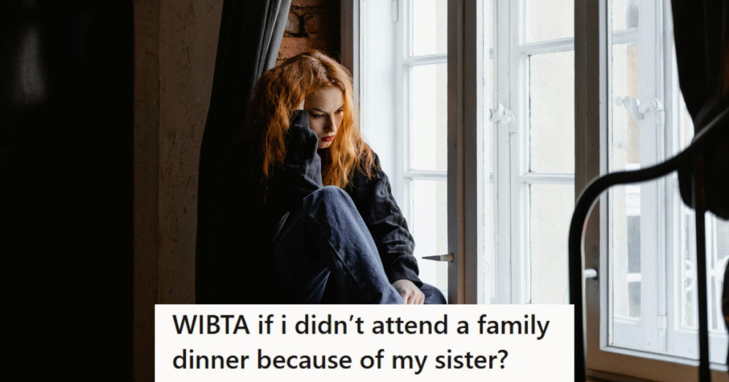 Girl sitting sadly near window