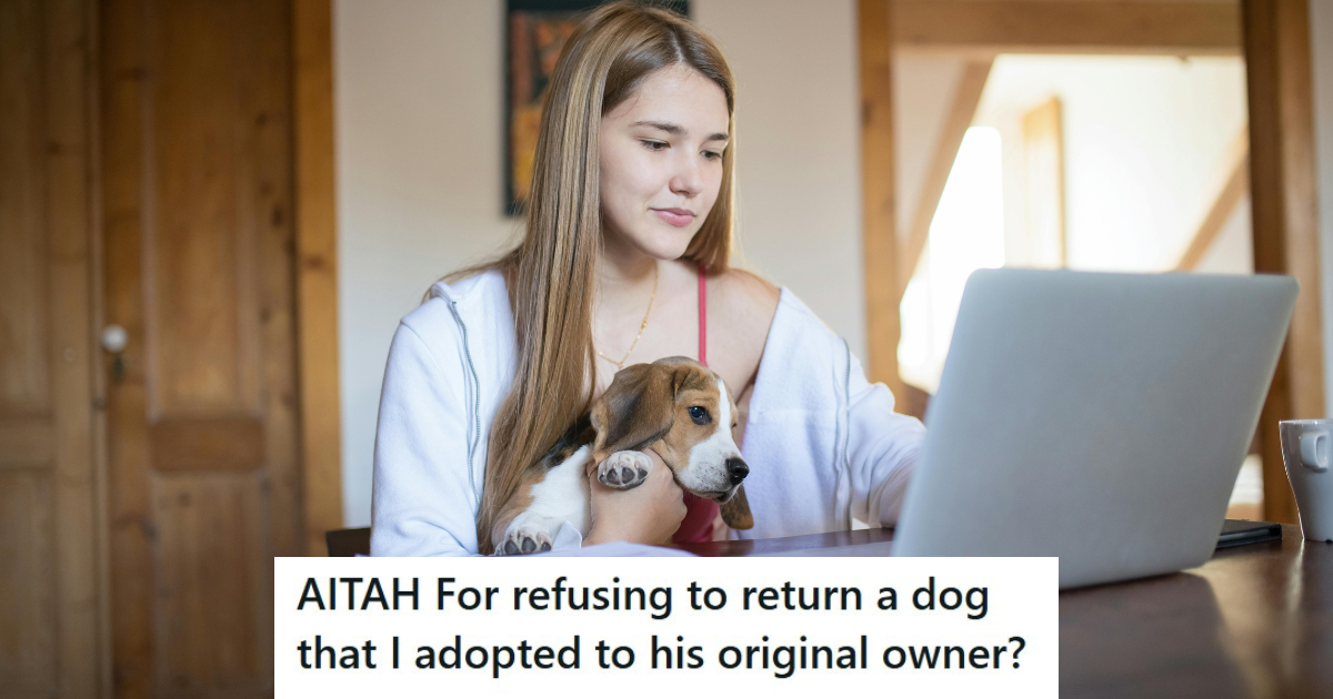 Girl holding a dog and working on her laptop