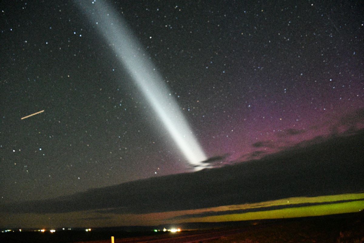 Rocket light in the night sky
