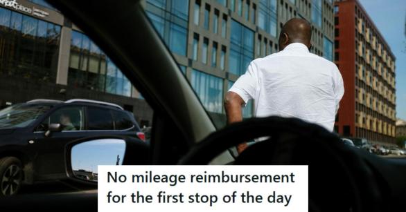 Man standing in front of his car on the phone before client meeting