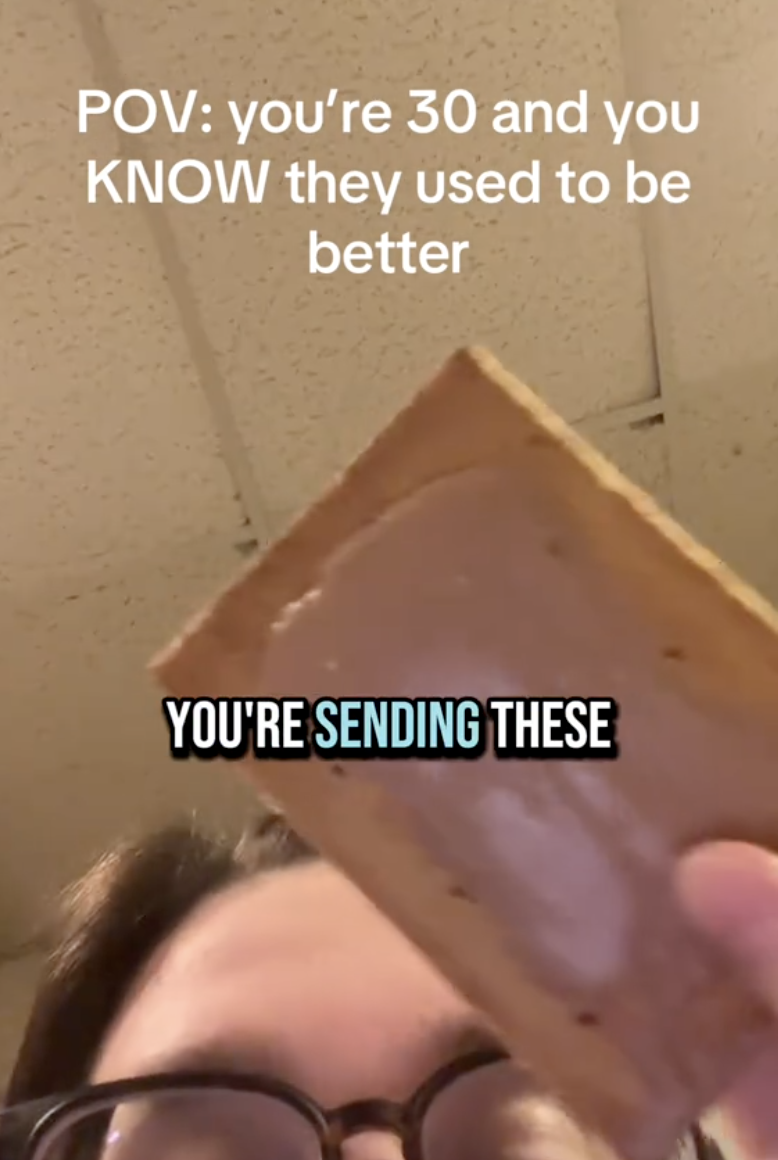 woman holding a pop tart