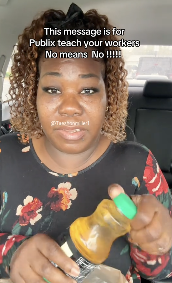 woman sitting in her car