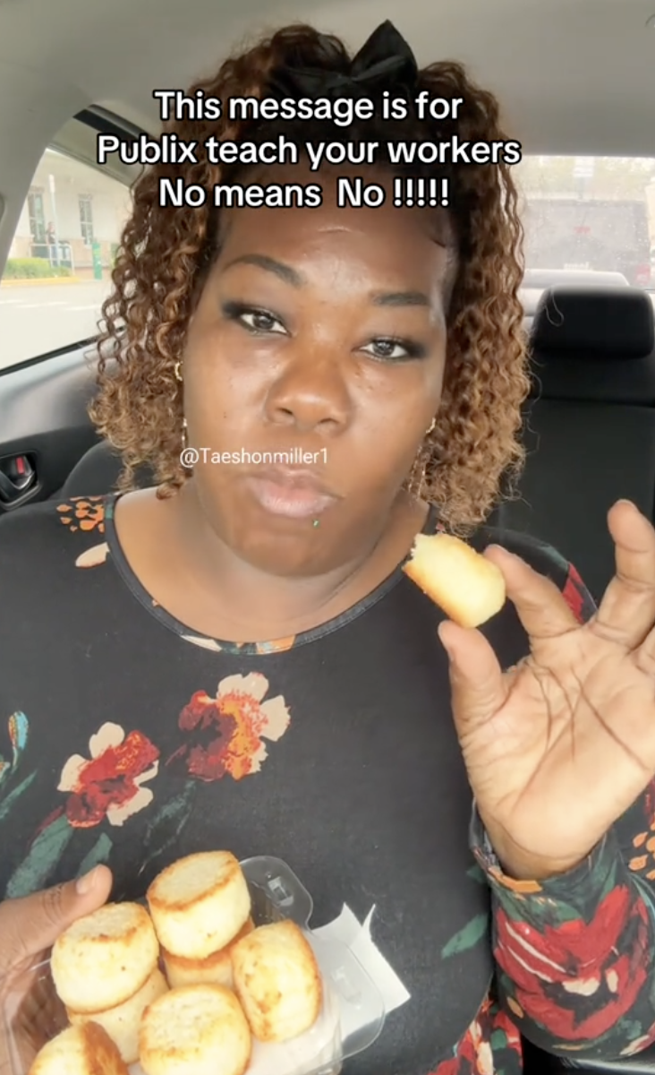woman eating while sitting in her car