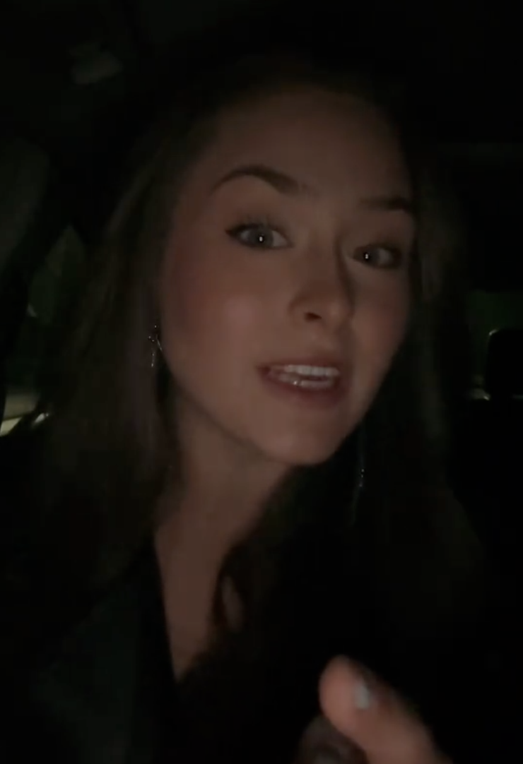 woman talking in her car