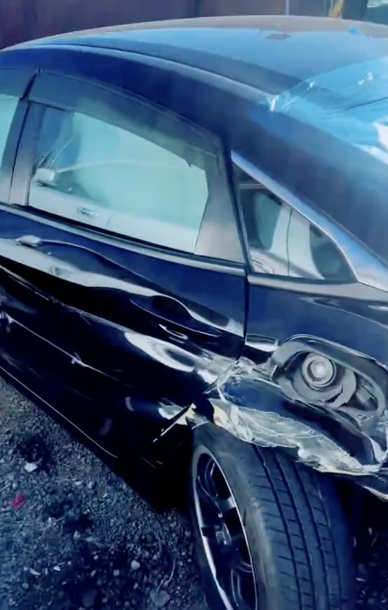 the back side of a wrecked honda