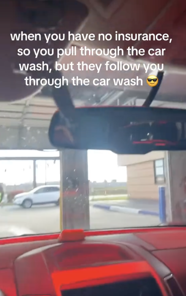 rear view mirror of a car in a car wash