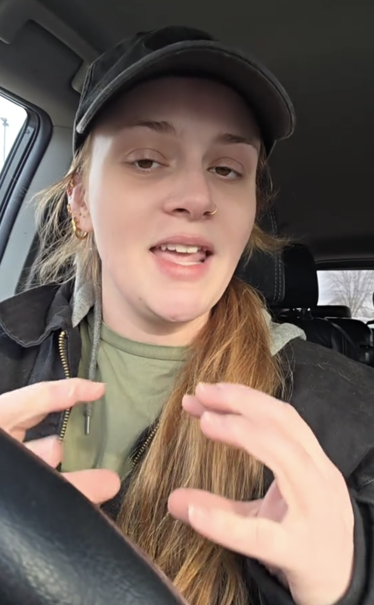 woman talking in her car