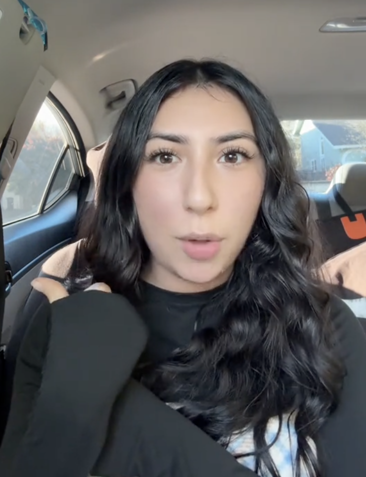 woman talking in her car