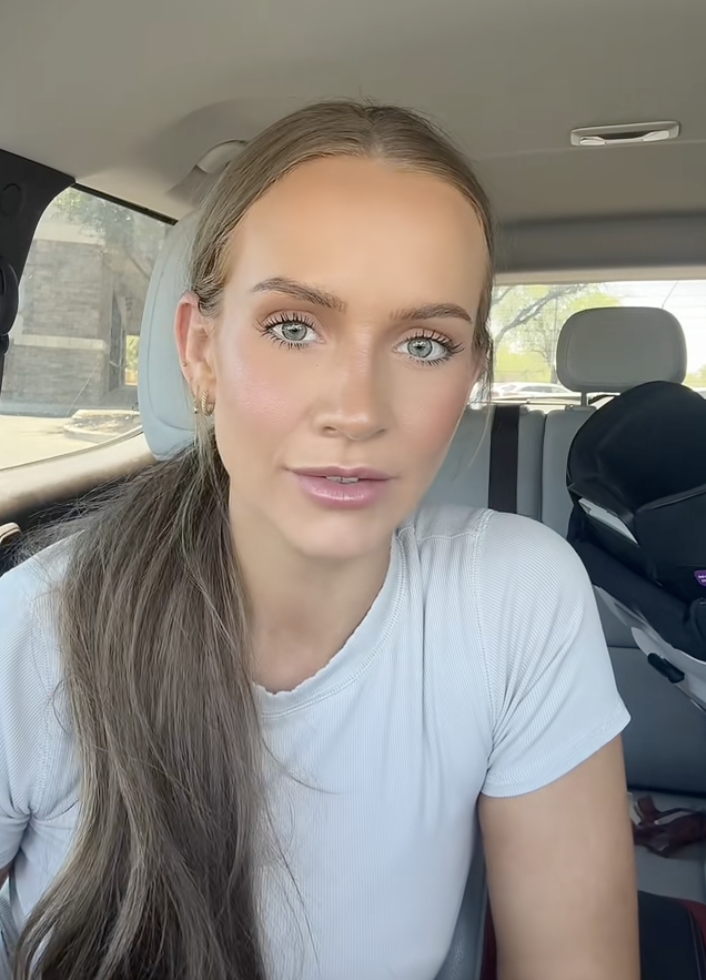 woman talking in her car