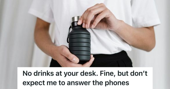 Woman holding reusable water bottle